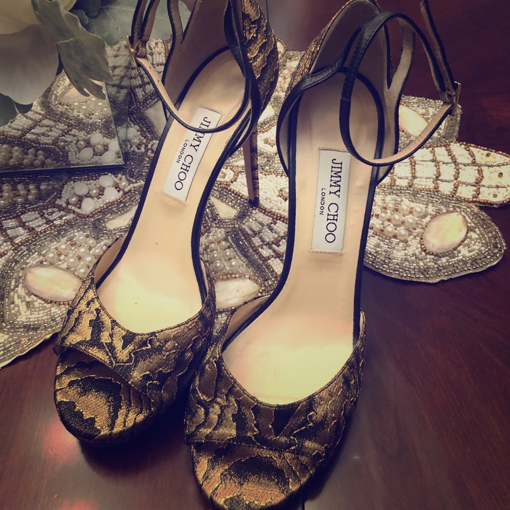 Jimmy Choo black and gold brocade heels.